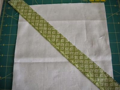 String Quilt Block Tutorial featured by top US quilting blog, A Quilting Life: image of string quilt block step one