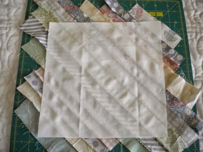 String Quilt Block Tutorial featured by top US quilting blog, A Quilting Life: image of string quilt block back