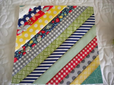 String Quilt Block Tutorial featured by top US quilting blog, A Quilting Life: image of string quilt block trimmed