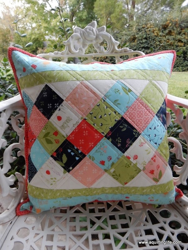 15 mini charm pack projects featured by top US quilting blog, A Quilting Life: mini charm pillow